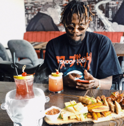 YCee Sarcastically Replies A Fan Who Questioned His Source Of Income 6